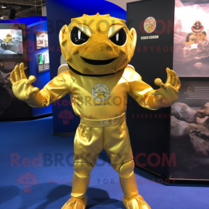 Gold Crab Cakes mascot costume character dressed with a Rash Guard and Lapel pins