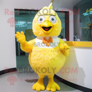 Lemon Yellow Chicken mascot costume character dressed with a Blouse and Mittens