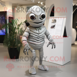 Silver Trilobite mascot costume character dressed with a Suit Pants and Eyeglasses