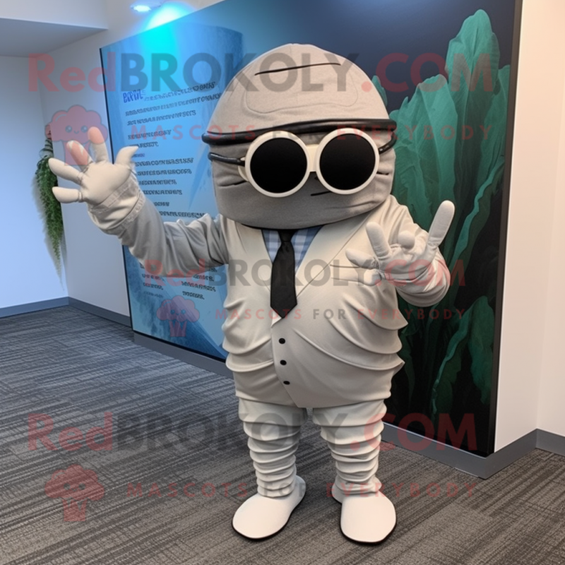 Silver Trilobite mascot costume character dressed with a Suit Pants and Eyeglasses Silver Trilobite mascot costume character dressed with a Suit Pants and Eyeglasses