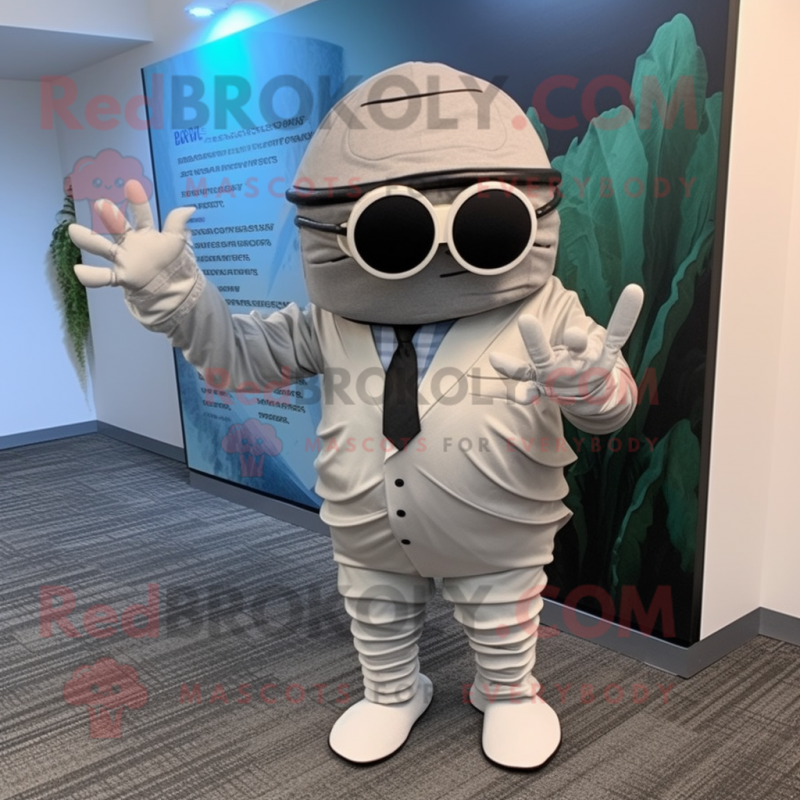 Silver Trilobite mascot costume character dressed with a Suit Pants and Eyeglasses