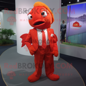 Red Goldfish mascot costume character dressed with a Polo Tee and Tie pins