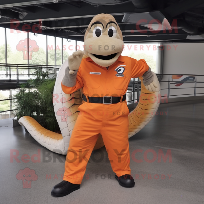 Orange Titanoboa mascot costume character dressed with a Dress Shirt and Suspenders Orange Titanoboa mascot costume character dressed with a Dress Shirt and Suspenders