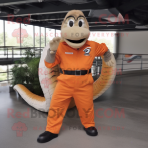 Orange Titanoboa mascot costume character dressed with a Dress Shirt and Suspenders