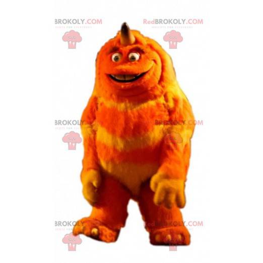 Mascote monstro peludo laranja e amarelo. Criatura peluda -