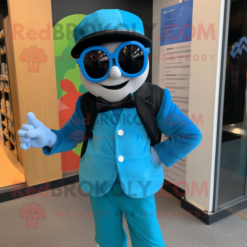 Turquoise Mime mascot costume character dressed with a Coat and Sunglasses