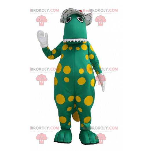 Grünes Dinosaurier-Maskottchen mit gelben Punkten -