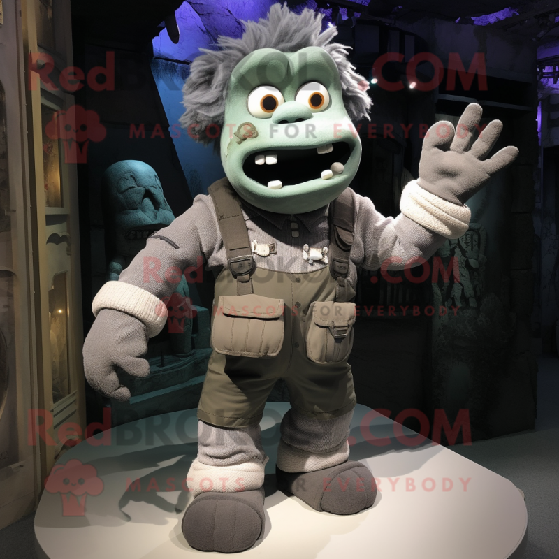 Gray Frankenstein mascot costume character dressed with a Cargo Shorts and Mittens