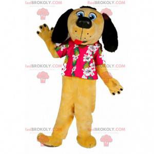 Mascote cão amarelo e preto vestido com uma camisa havaiana -