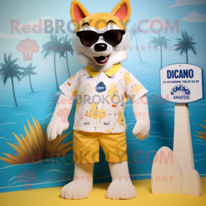 Cream Dingo mascot costume character dressed with a Swimwear and Sunglasses