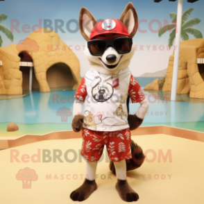 Cream Dingo mascot costume character dressed with a Swimwear and Sunglasses