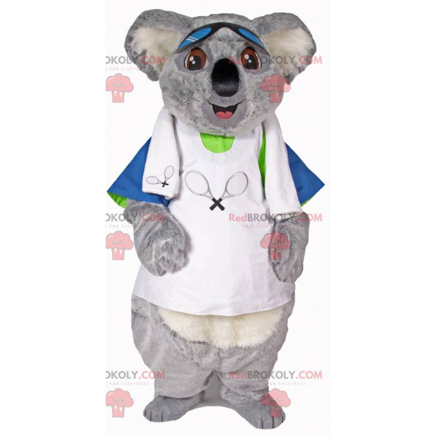 Mascotte de koala gris et blanc en tenue de tennisman -