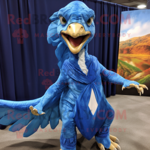 Blue Utahraptor mascot costume character dressed with a Mini Dress and Shawl pins