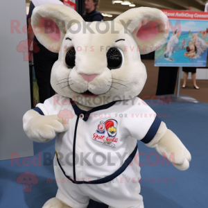 Cream Chinchilla mascot costume character dressed with a Polo Tee and Brooches