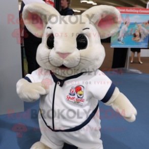 Cream Chinchilla mascot costume character dressed with a Polo Tee and Brooches