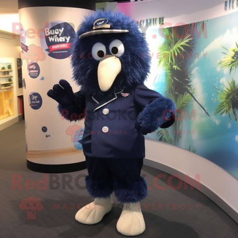 Navy Kiwi mascot costume character dressed with a Trousers and Hair clips Navy Kiwi mascot costume character dressed with a Trousers and Hair clips