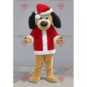 Beige and black dog mascot dressed as Santa Claus -