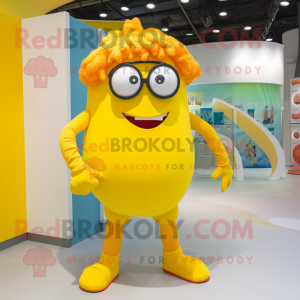 Yellow Cyclops mascot costume character dressed with a Capri Pants and Eyeglasses
