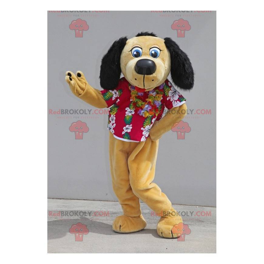 Beige und schwarzes Hundemaskottchen mit einem Blumenhemd -
