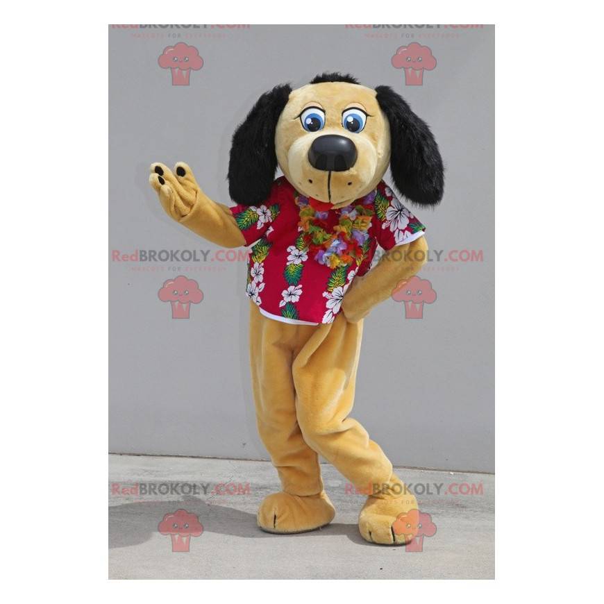 Mascotte de chien beige et noir avec une chemise à fleurs -