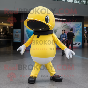 Lemon Yellow Killer Whale mascot costume character dressed with a Skinny Jeans and Belts