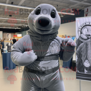 Gray Navy Seal mascot costume character dressed with a Bodysuit and Wraps