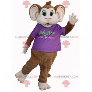 Mascotte de singe marron et blanc aux yeux verts -