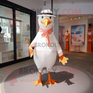 Peach Seagull mascot costume character dressed with a Rash Guard and Bow ties