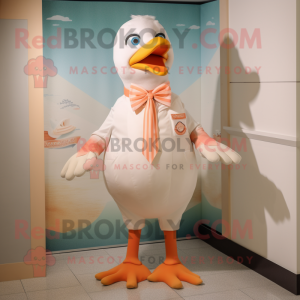 Peach Seagull mascot costume character dressed with a Rash Guard and Bow ties