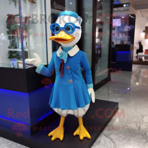 Blue Muscovy Duck mascot costume character dressed with a Mini Skirt and Eyeglasses