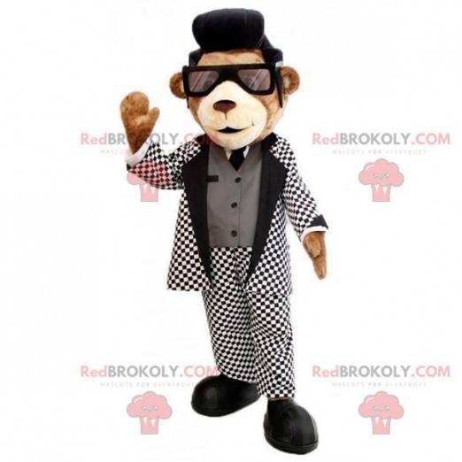 Mascotte de nounours marron avec un joli costume noir et blanc