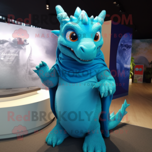 Cyan Dragon mascot costume character dressed with a Cover-up and Anklets