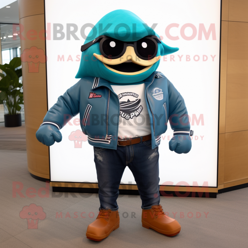 Teal Fish Tacos mascot costume character dressed with a Biker Jacket and Shoe clips Teal Fish Tacos mascot costume character dressed with a Biker Jacket and Shoe clips