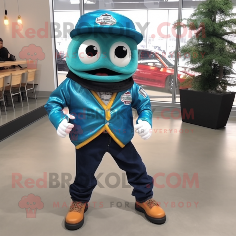 Teal Fish Tacos mascot costume character dressed with a Biker Jacket and Shoe clips Teal Fish Tacos mascot costume character dressed with a Biker Jacket and Shoe clips