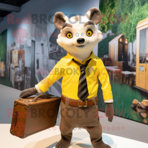 Yellow Civet mascot costume character dressed with a Oxford Shirt and Briefcases