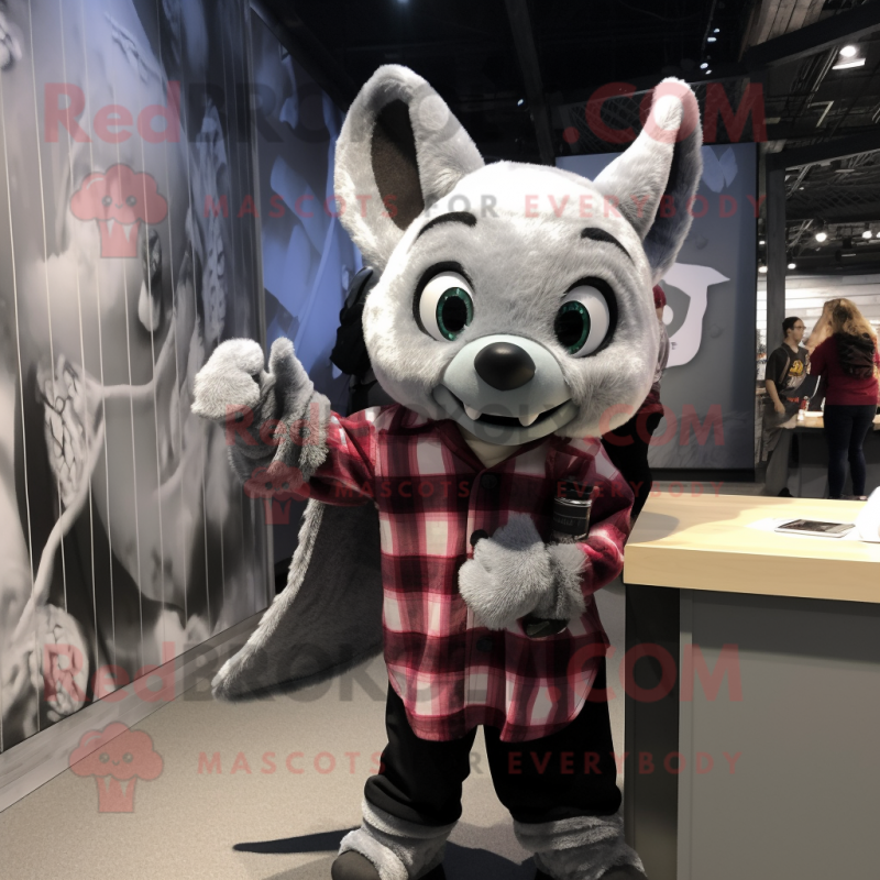 Silver Bat mascot costume character dressed with a Flannel Shirt and Watches Silver Bat mascot costume character dressed with a Flannel Shirt and Watches