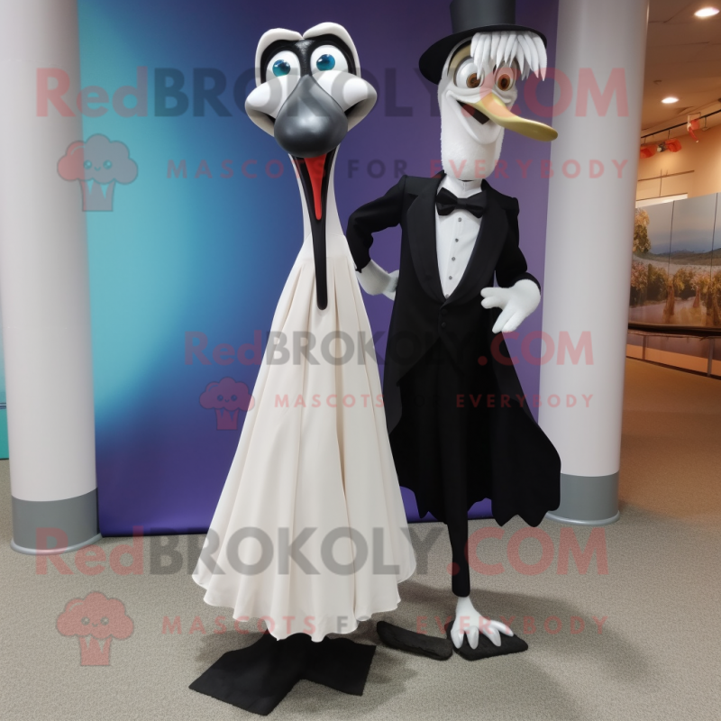 Black Stilt Walker mascot costume character dressed with a Wedding Dress and Shoe clips Black Stilt Walker mascot costume character dressed with a Wedding Dress and Shoe clips