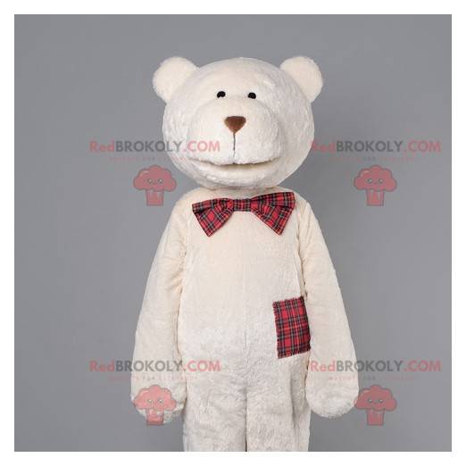 Beige teddy bear mascot with a plaid bow tie - Redbrokoly.com