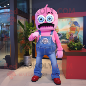 Pink Cyclops mascot costume character dressed with a Denim Shirt and Keychains