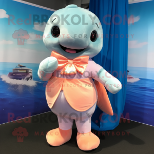 Peach Stellar'S Sea Cow mascot costume character dressed with a Capri Pants and Bow ties