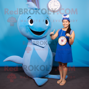 Blue Narwhal mascot costume character dressed with a Sheath Dress and Watches