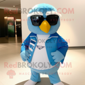 Sky Blue Hawk mascot costume character dressed with a Wrap Skirt and Sunglasses