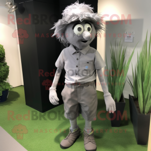 Gray Scarecrow mascot costume character dressed with a Polo Shirt and Cufflinks