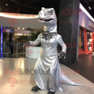 Silver T Rex mascot costume character dressed with a Evening Gown and Headbands