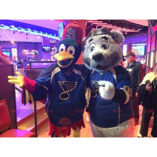 2 mascots: a gray bear and a black red and yellow bird -