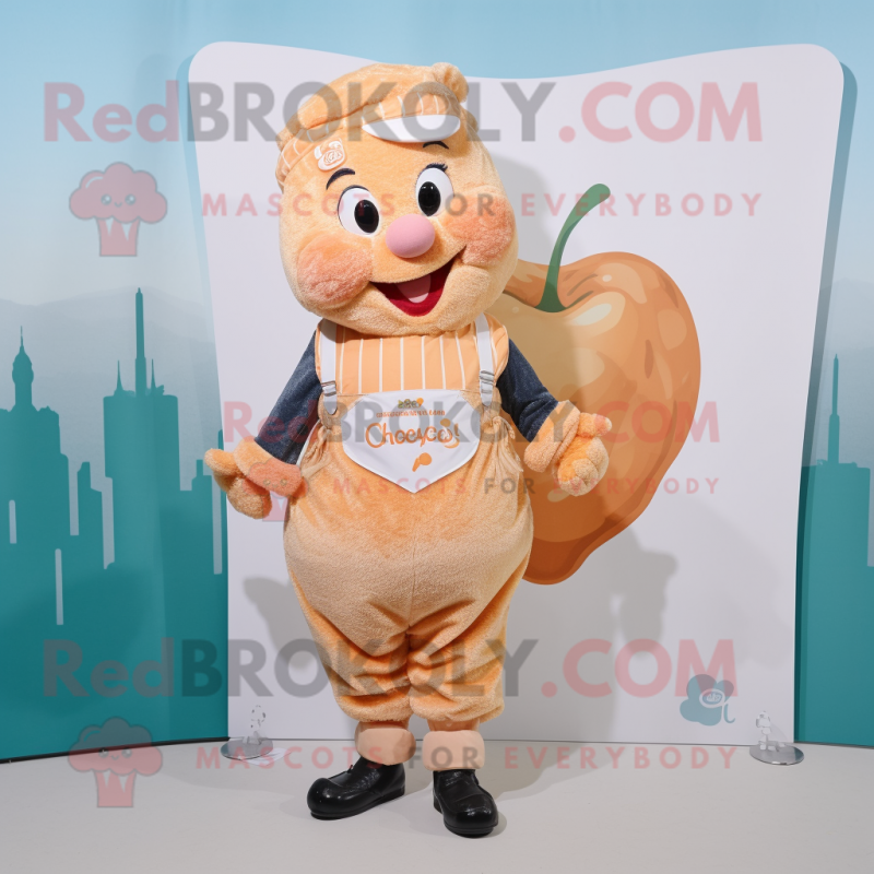 Peach Croissant mascot costume character dressed with a Dungarees and Lapel pins