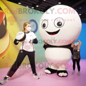 Cream Handball Ball mascot costume character dressed with a Yoga Pants and Digital watches