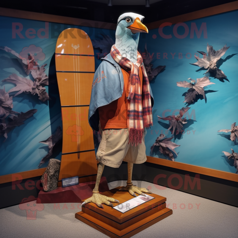 Rust Passenger Pigeon mascot costume character dressed with a Board Shorts and Scarf clips