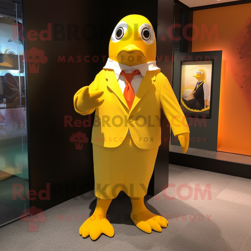 Yellow Penguin mascot costume character dressed with a Dress Pants and Cufflinks