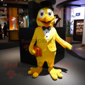 Yellow Penguin mascot costume character dressed with a Dress Pants and Cufflinks